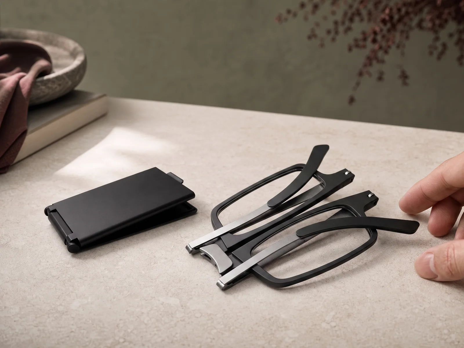 SKYOAK folding readers beside their compact case