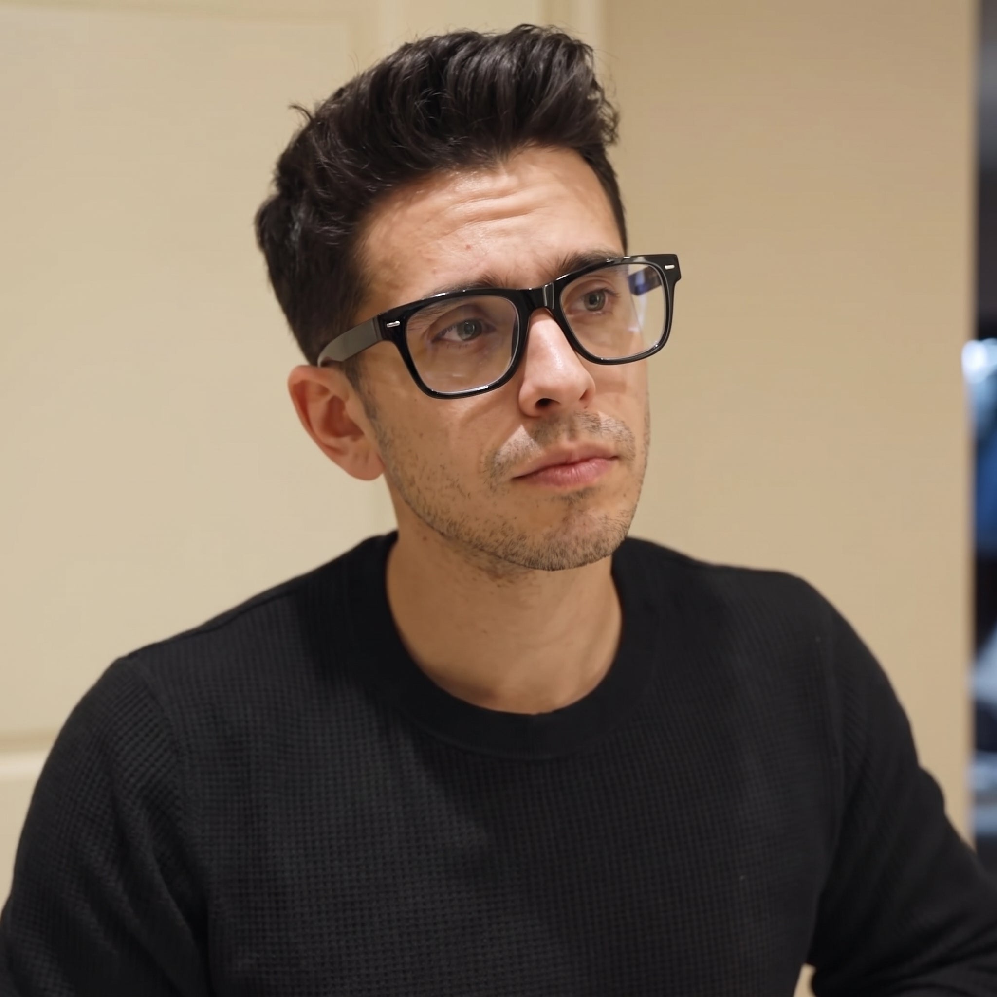 Man wearing black SKYOAK reading glasses
